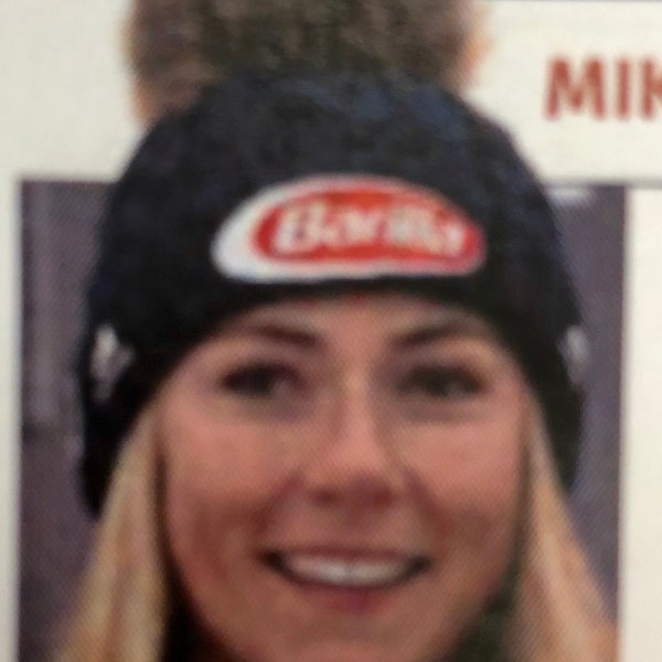 a close up of a person smiling for the camera