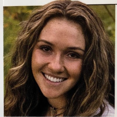 a woman smiling for the camera