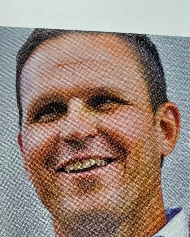 a close up of Tony Boselli smiling for the camera