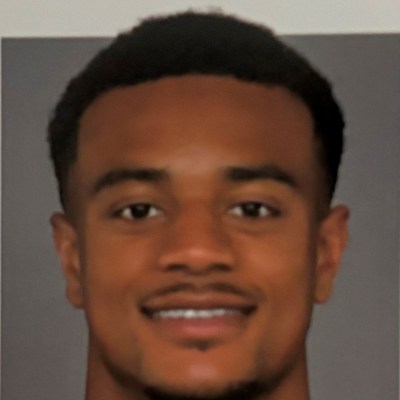 Patrick Surtain II a person who is smiling and looking at the camera